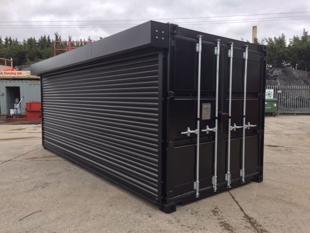 Black shipping container fitted with a full-width roller shutter